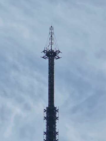 The antenna at the very tip of the Eiffel Tower