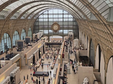 The far end of the hall and the clock