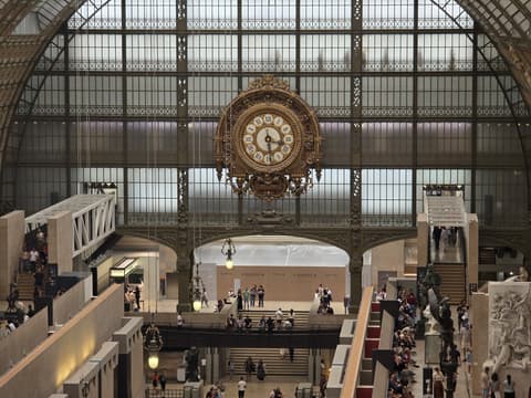 The clock against the glass wall