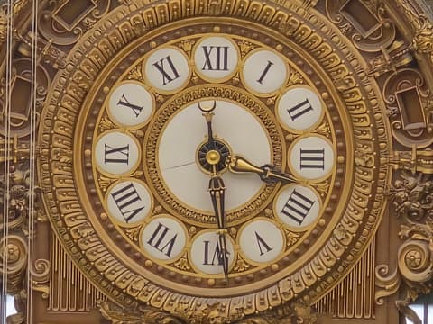 The clock face and its Roman numerals filling the frame